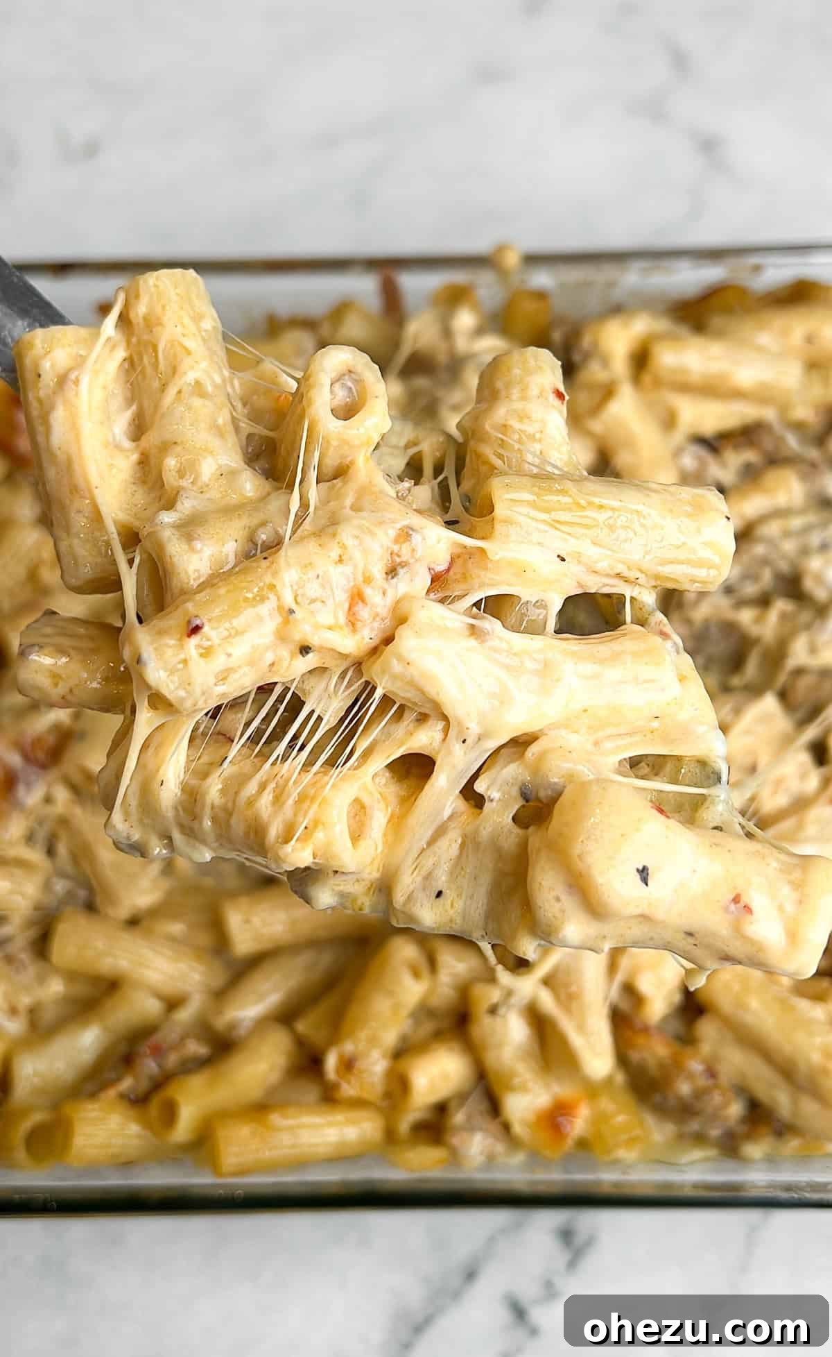 Hearty Creamy Sausage Alfredo Bake 5 all ingredients for sausage alfredo laid out