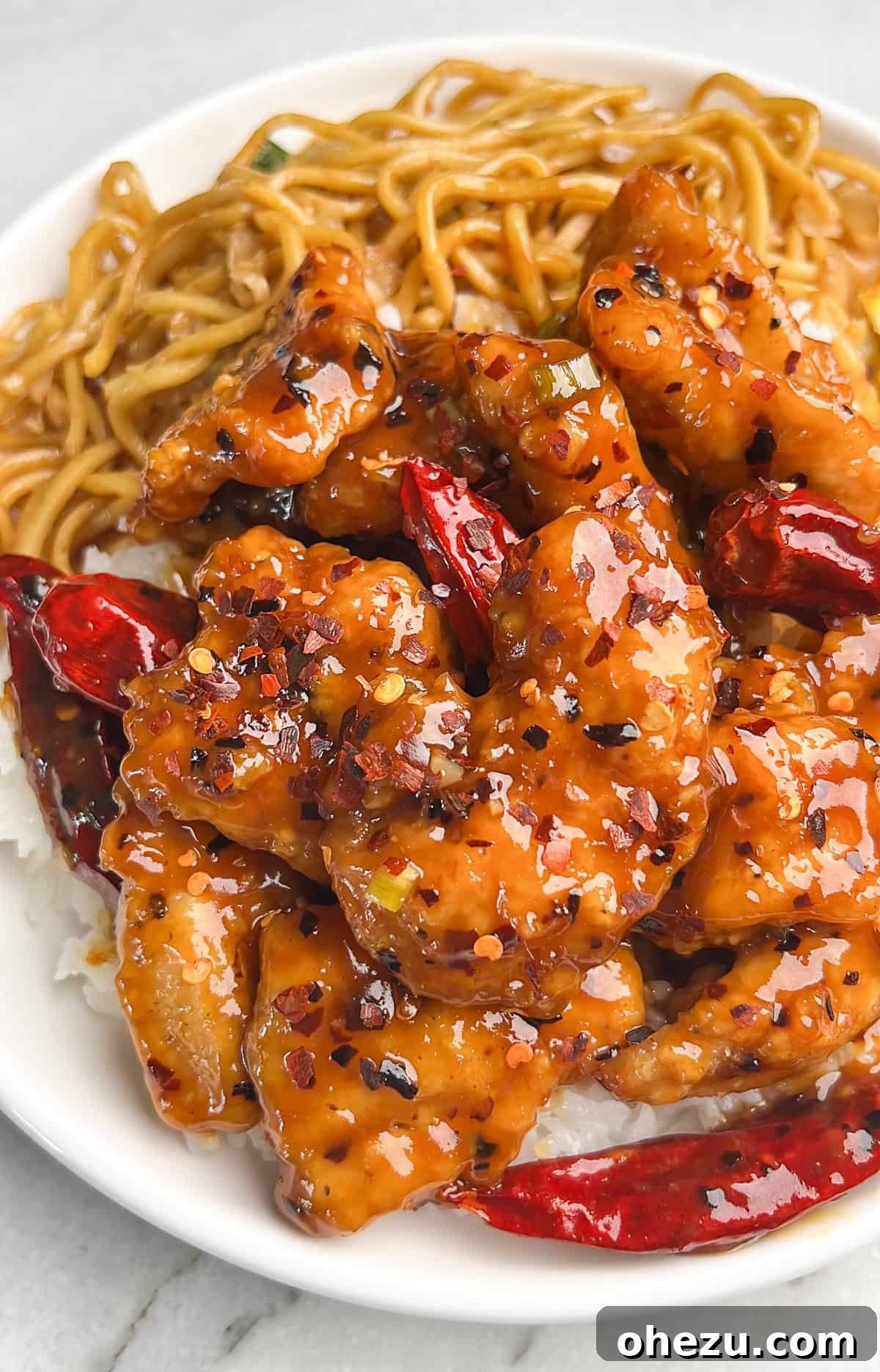 Preparing the Hot Orange Chicken in a wok