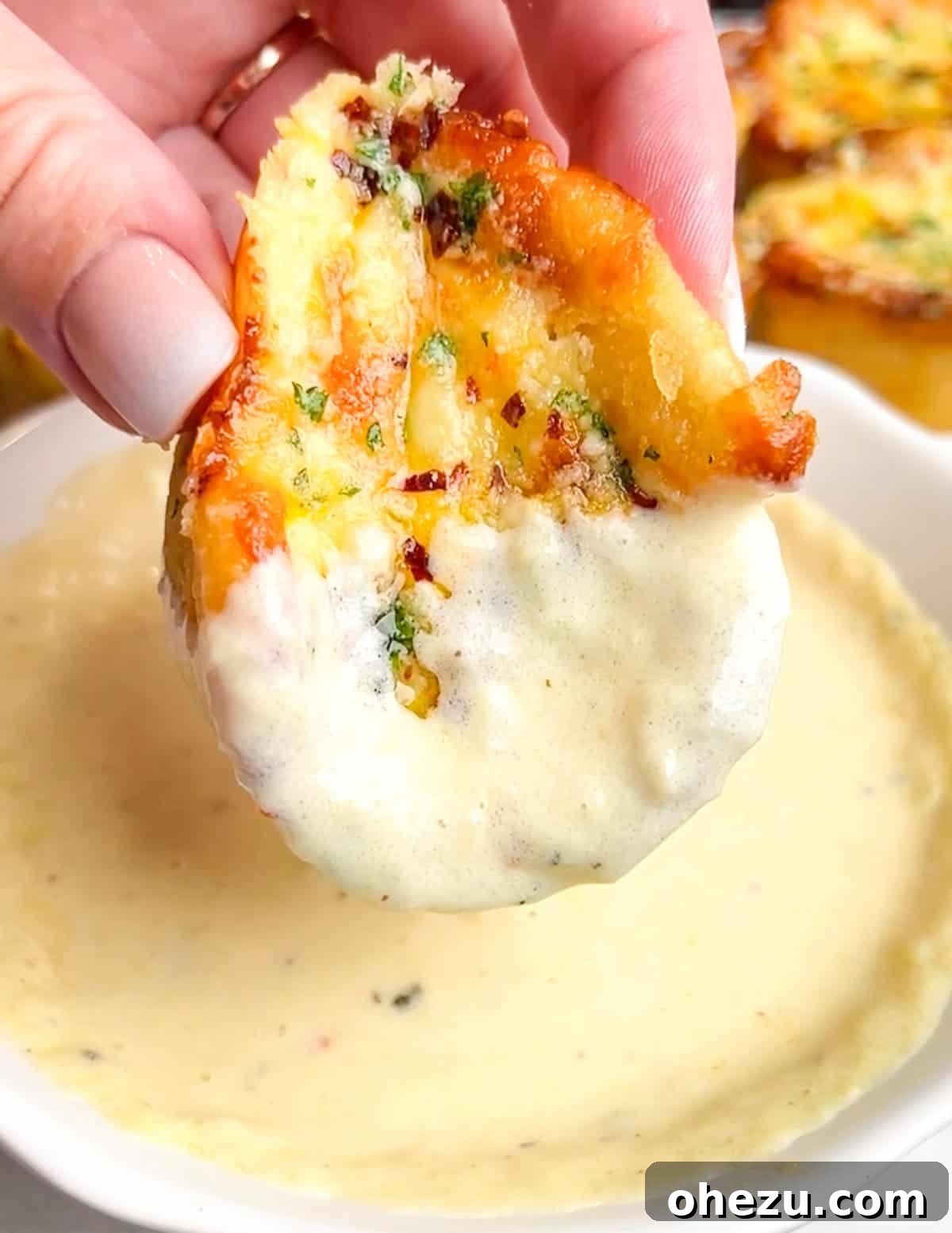 Little Caesars Chicken Alfredo Crazy Puffs 9 Little Caesars Crazy Puffs arranged on a cooling rack