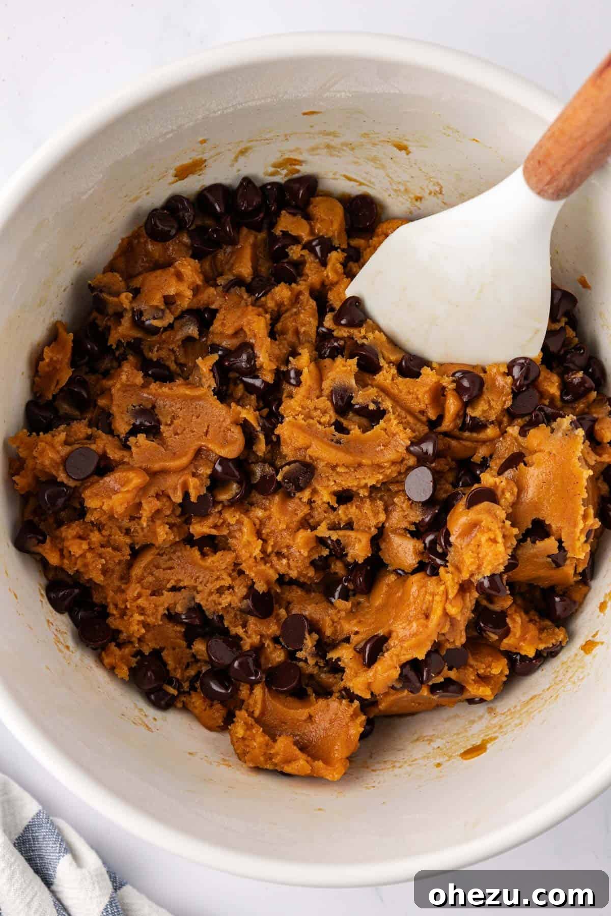 Vegan pumpkin chocolate chip cookie batter with chocolate chips