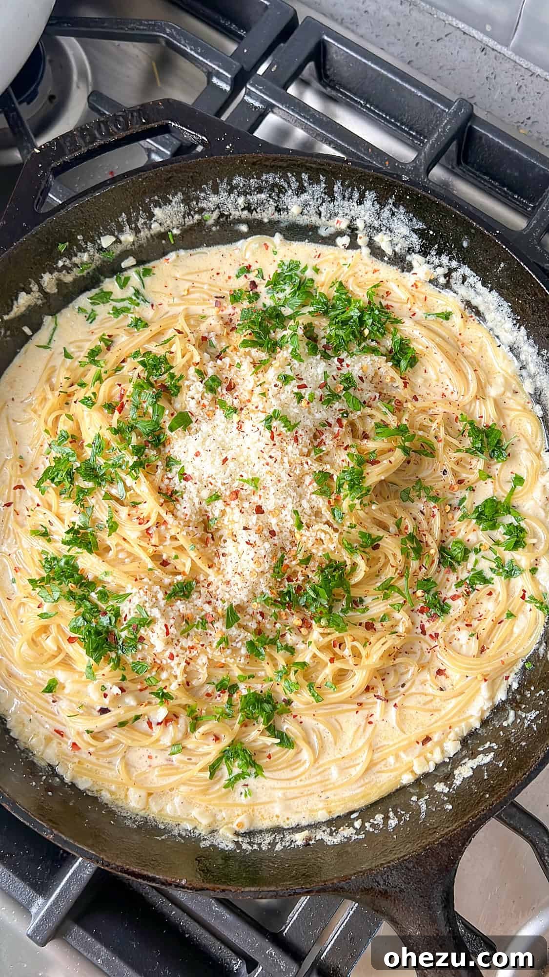 Adding finishing touches to the pasta