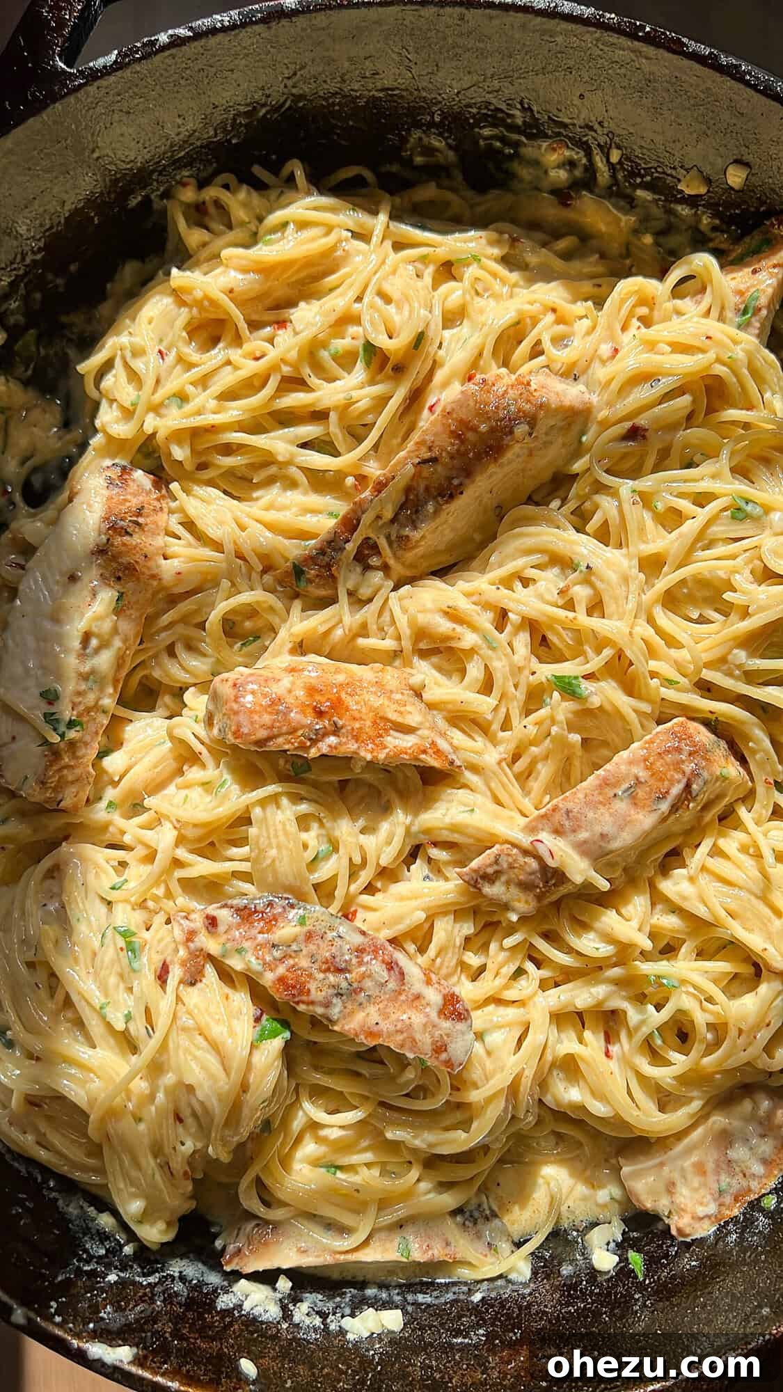 Cooking the chicken for garlic parmesan pasta