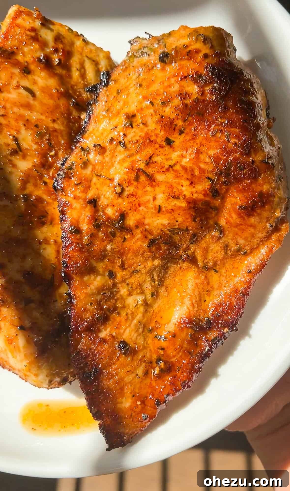Seasoning and cooking chicken breasts