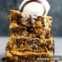 Golden brown gluten-free cookie bars, secretly healthy but tasting incredibly decadent, reminiscent of a fancy restaurant dessert. These bars are also dairy-free and packed with flavor.
