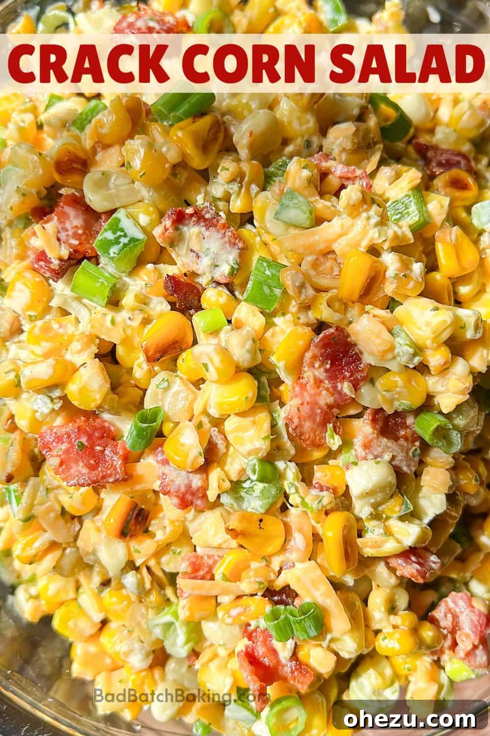 Large serving bowl of Crack Corn Salad on a rustic wooden table, ready for a gathering.