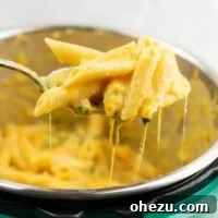 Instant Pot Creamy Sweet Potato Pasta (vegetarian) – this is the perfect fall recipe and tastes AMAZING! Even my two year old loved it, and it was a great way to sneak in more veggies! Definitely will be making this one again. #instantpot #instantpotrecipe #instantpotvegetarian #vegetarian #easydinner #dinner #vegetariandinner #sweetpotatorecipe #fallrecipe
