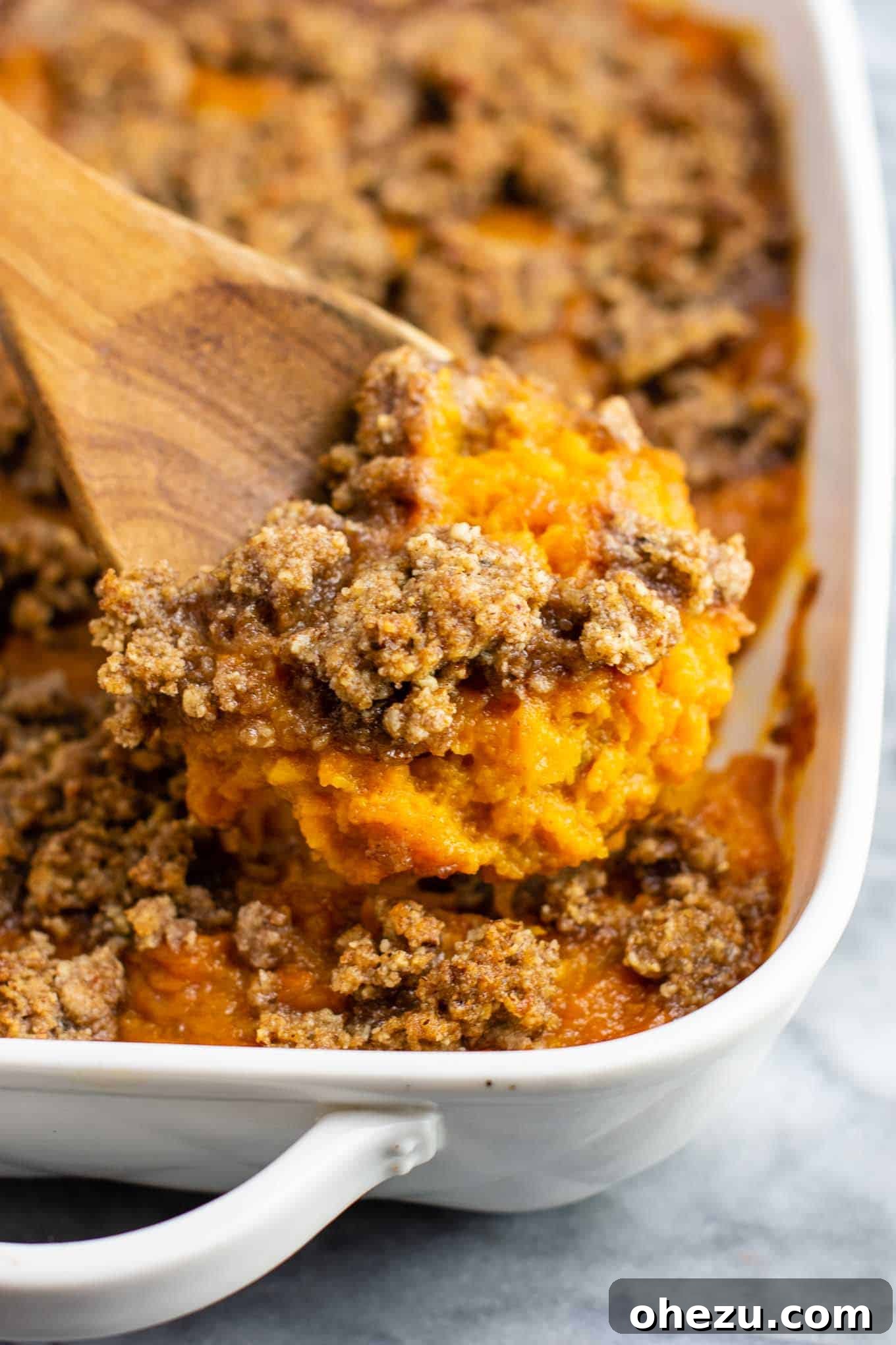 vegetarian thanksgiving menu - Sweet potato casserole with pecan topping - This tastes incredible and everyone loves it! #sweetpotatocasserole #thanksgiving #pecans #glutenfree #vegetarian
