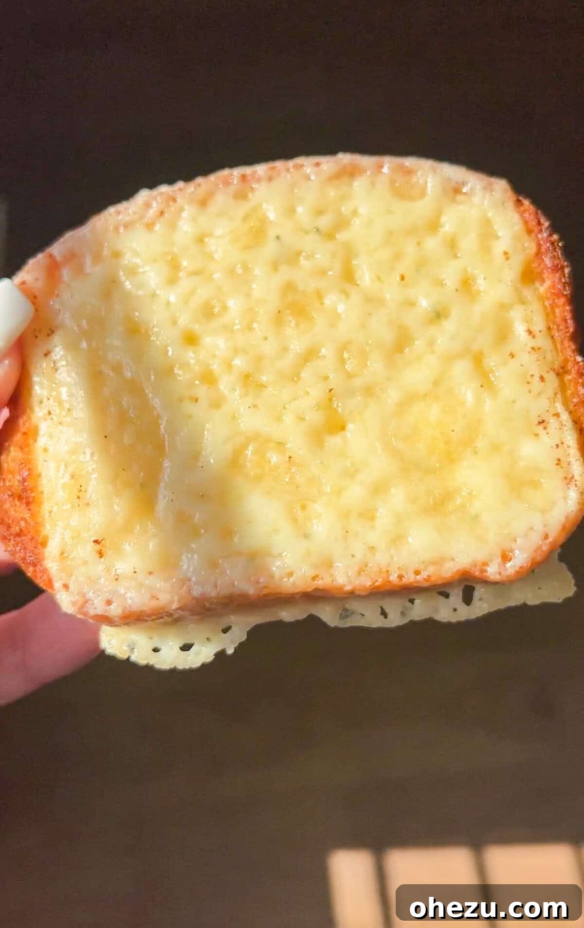Cheesy Texas toast baking in the oven