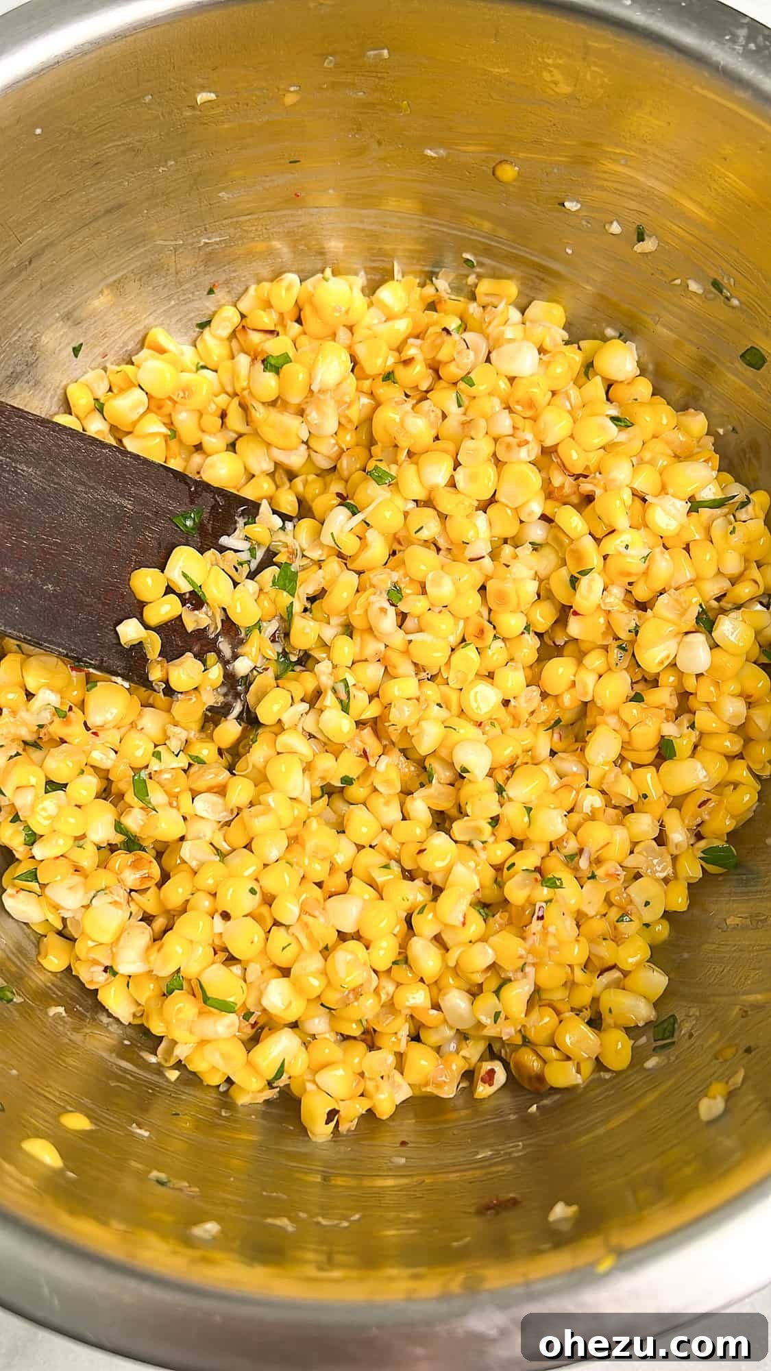One-Pan Garlic Parmesan Chicken and Rice Skillet with Corn 5 Sautéing corn for the skillet