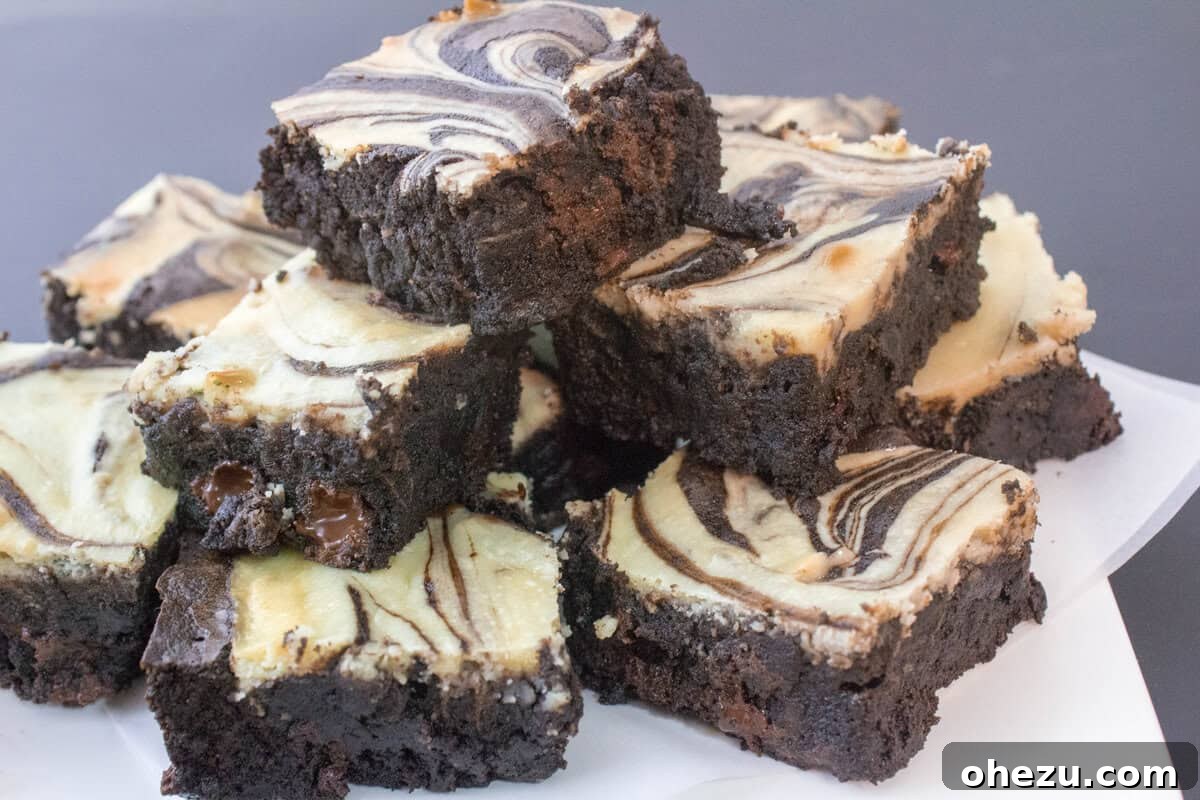 Close-up of Marbled Chewy Chocolatey Cheesecake Brownies showing the beautiful swirl pattern
