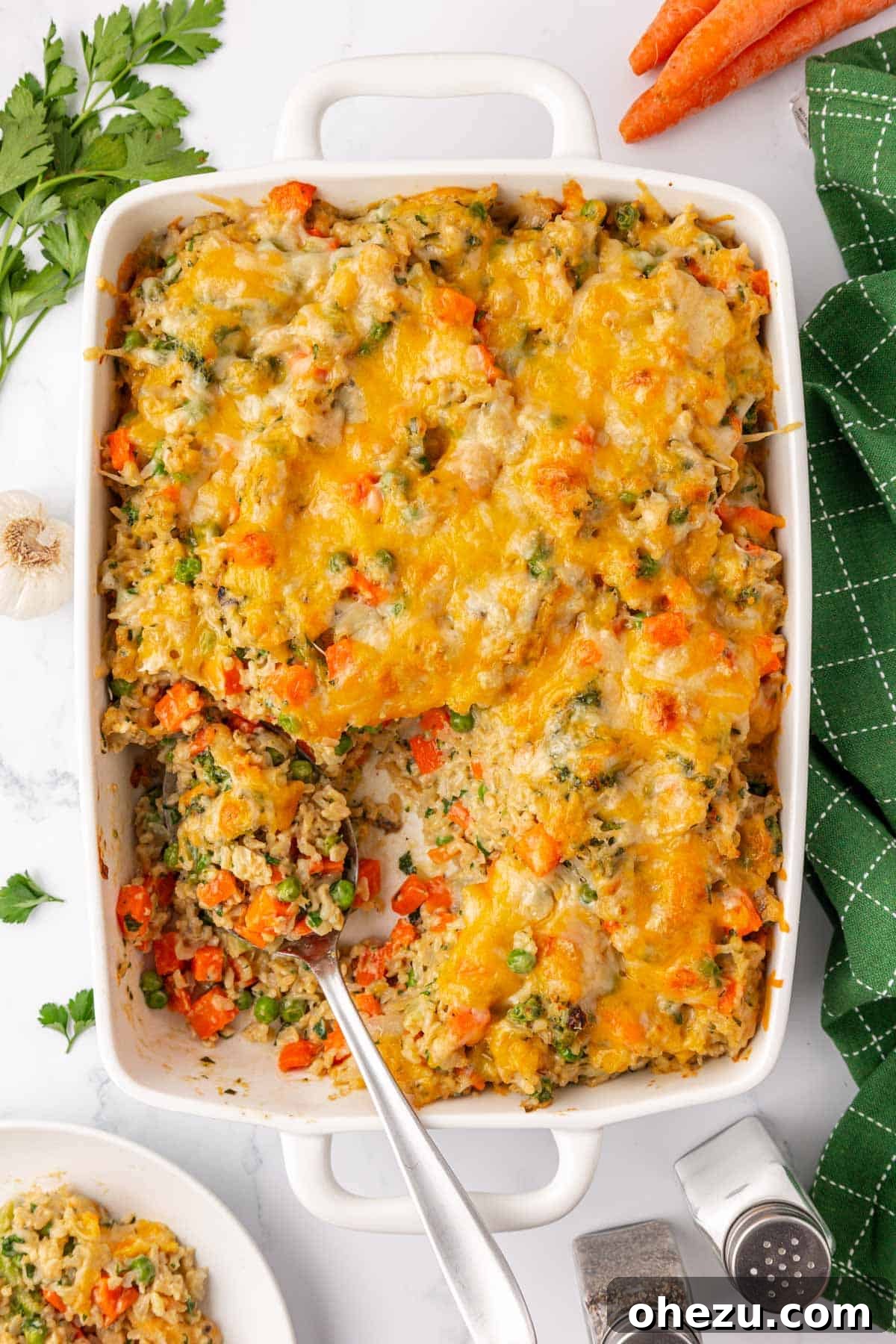 Hearty Vegetable Rice Bake 15 Freshly baked vegetable rice casserole, golden brown and bubbly from the oven