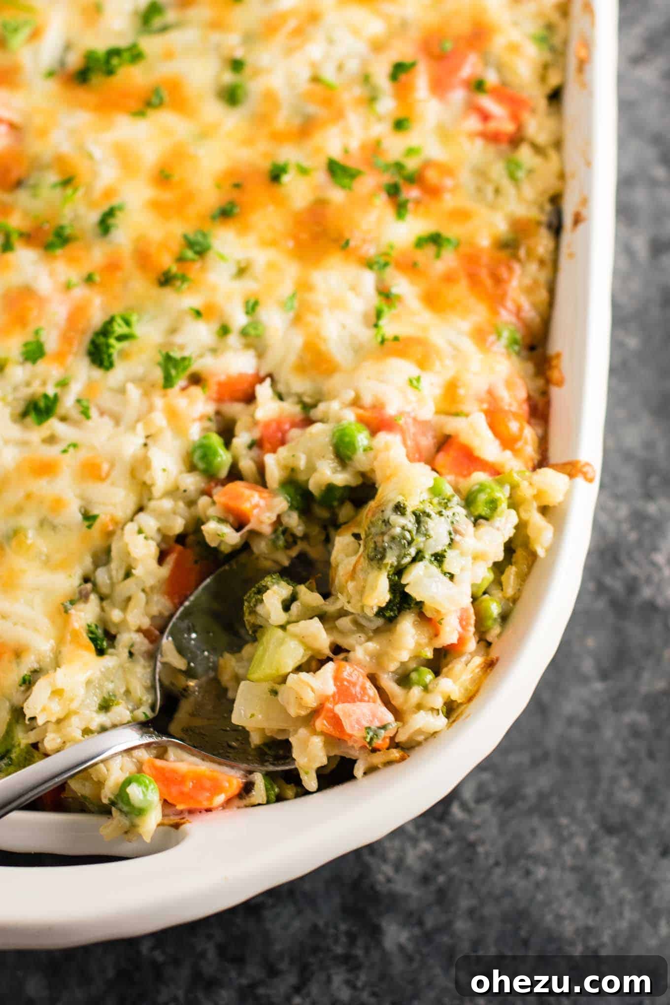 Hearty Vegetable Rice Bake 20 Large, comforting pan of vegetable rice casserole, ready for a big family meal