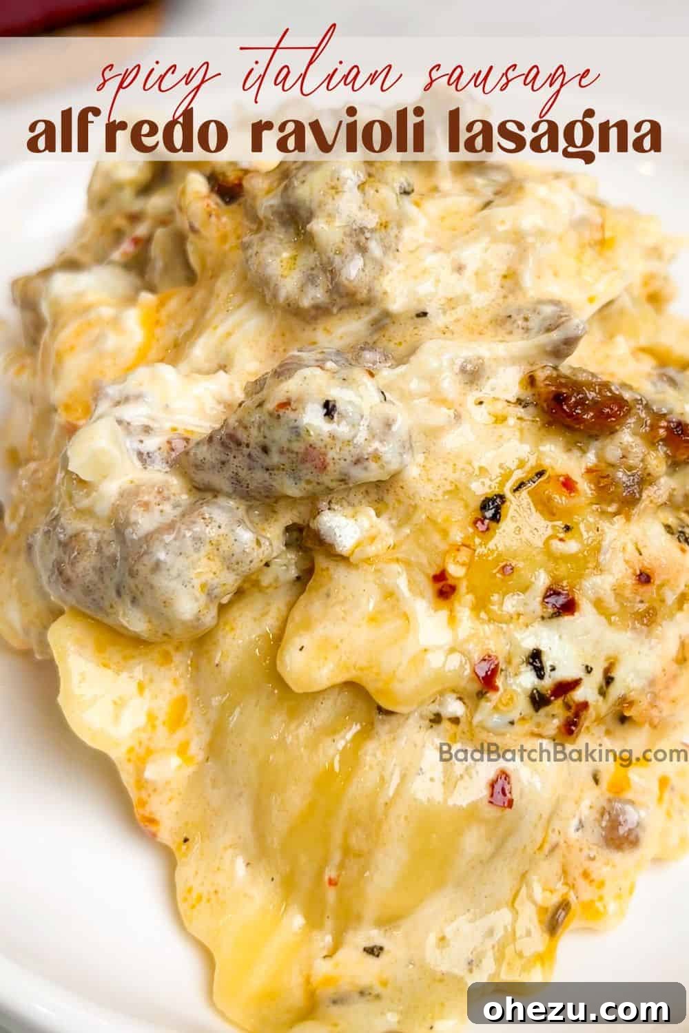 A wide shot of the Alfredo Ravioli Lasagna being prepared in a kitchen setting, showing the rich texture.