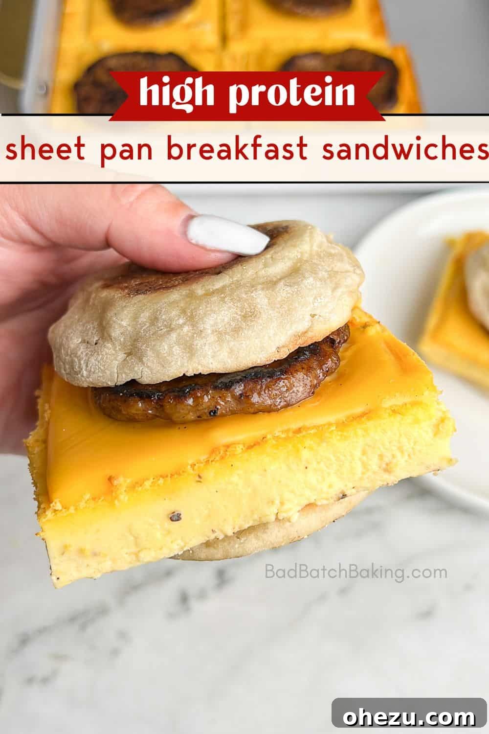 One-Pan Protein Power Breakfast Sandwiches 7 Side view of a high protein sheet pan breakfast sandwich, unwrapped and ready to be enjoyed, showing layers of egg, cheese, and sausage