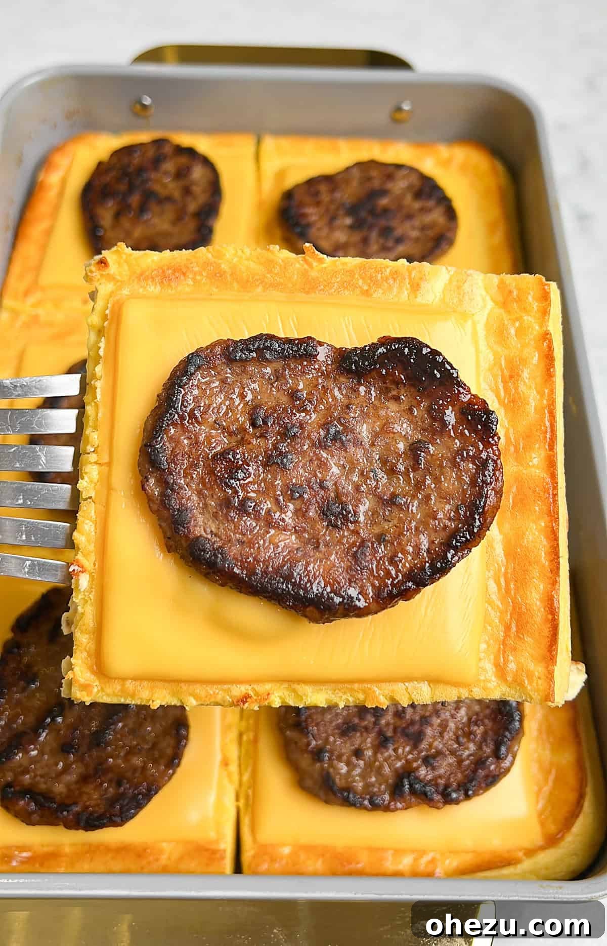 One-Pan Protein Power Breakfast Sandwiches 9 A selection of high protein sheet pan breakfast sandwiches ready for serving, showcasing their delicious layers