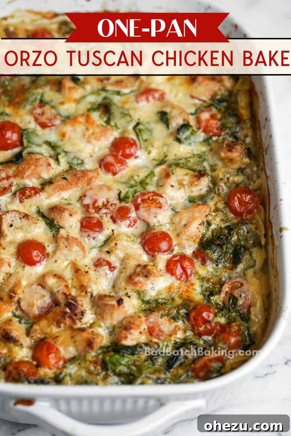 Creamy Tuscan Chicken Orzo Skillet 6 A serving of Tuscan Chicken Bake with fresh herbs, showcasing its creamy texture
