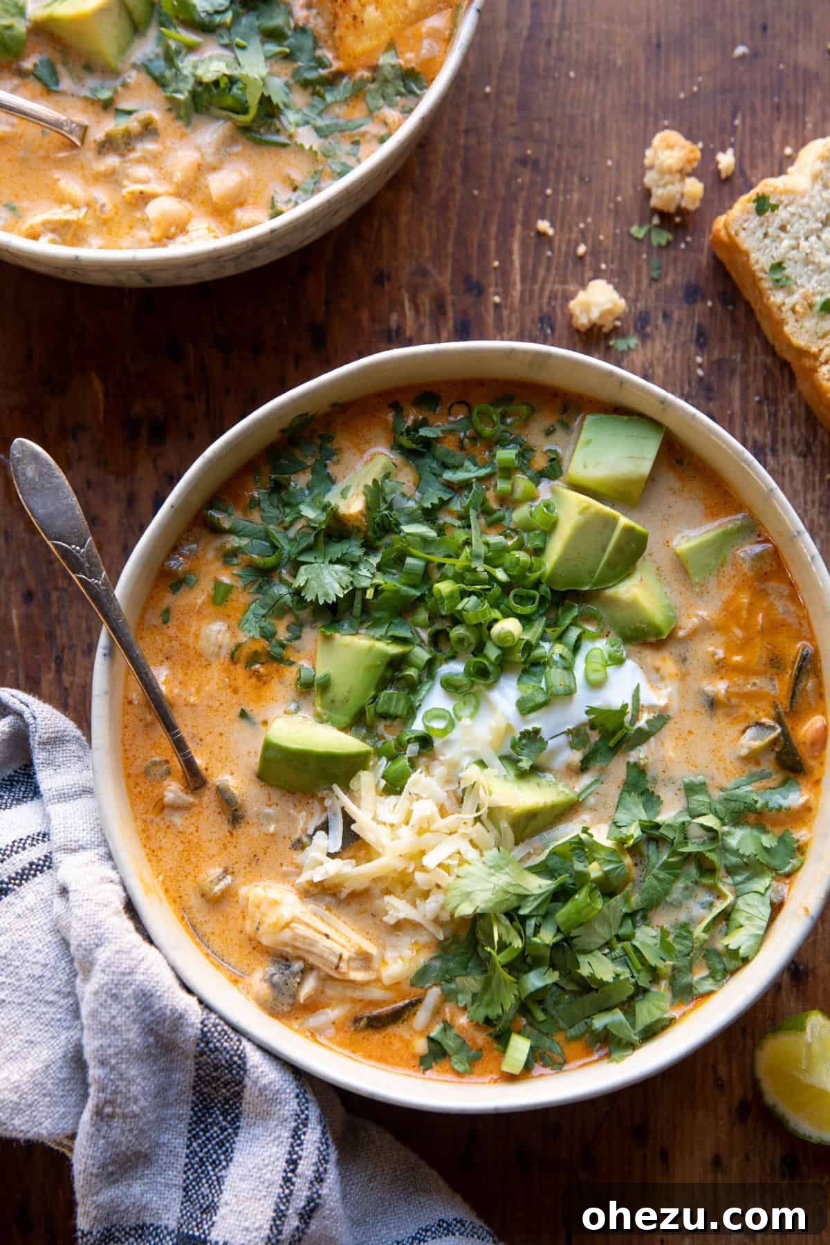 Creamy white chicken chili with toppings