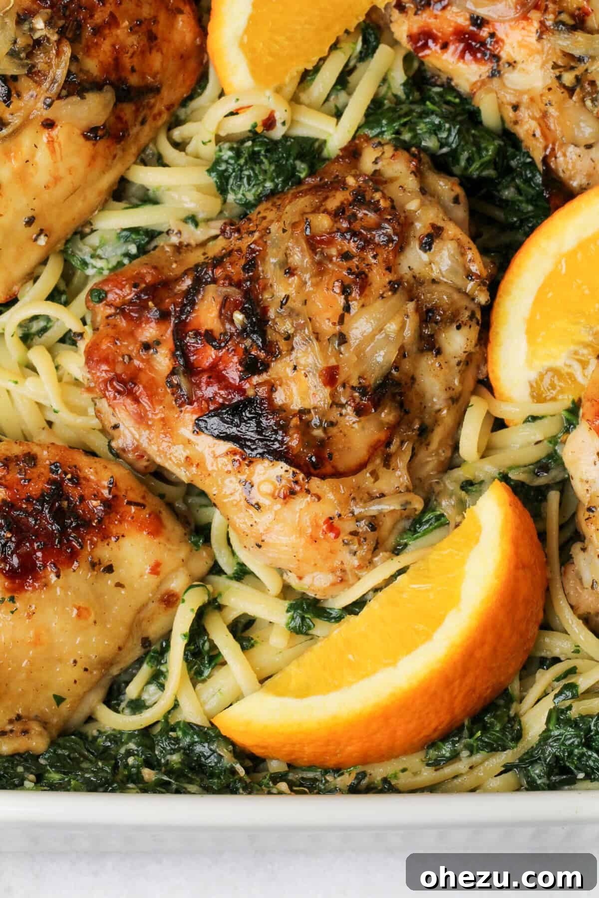 Baked chicken linguini with spinach and parmesan