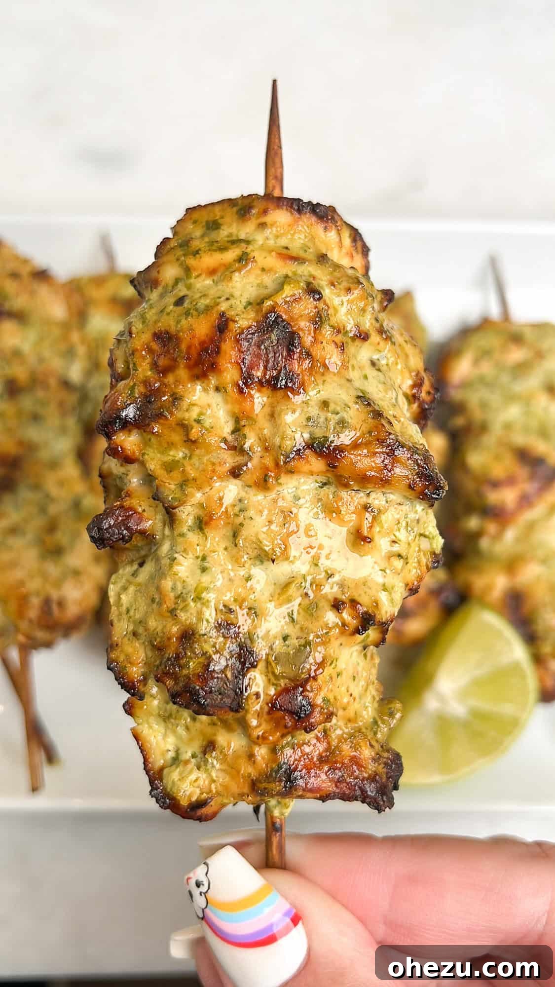 Zesty Cilantro Lime Air Fryer Chicken Skewers 2 Bright and vibrant cilantro lime air fryer chicken skewers on a wooden skewer, ready to be cooked.