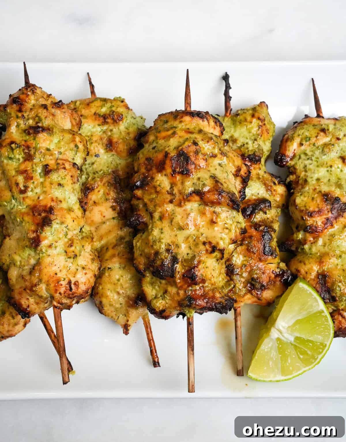 Zesty Cilantro Lime Air Fryer Chicken Skewers 8 A platter of perfectly cooked chicken skewers, ready to be served.