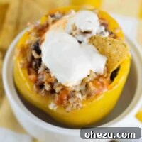 No-Fuss Slow Cooker Plant-Based Stuffed Peppers 11 Vegetarian Crockpot Stuffed Peppers Recipe Image