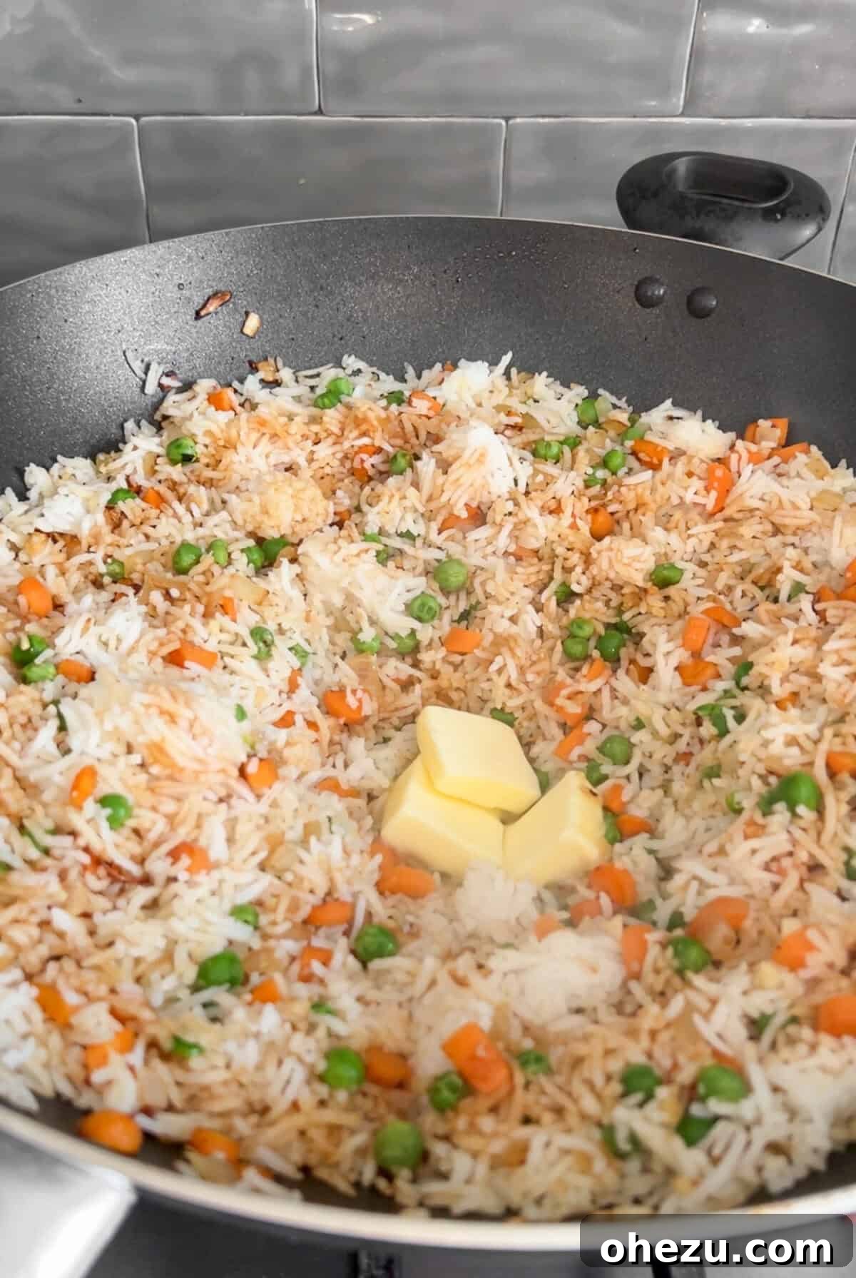 mango chicken fried rice in a wok