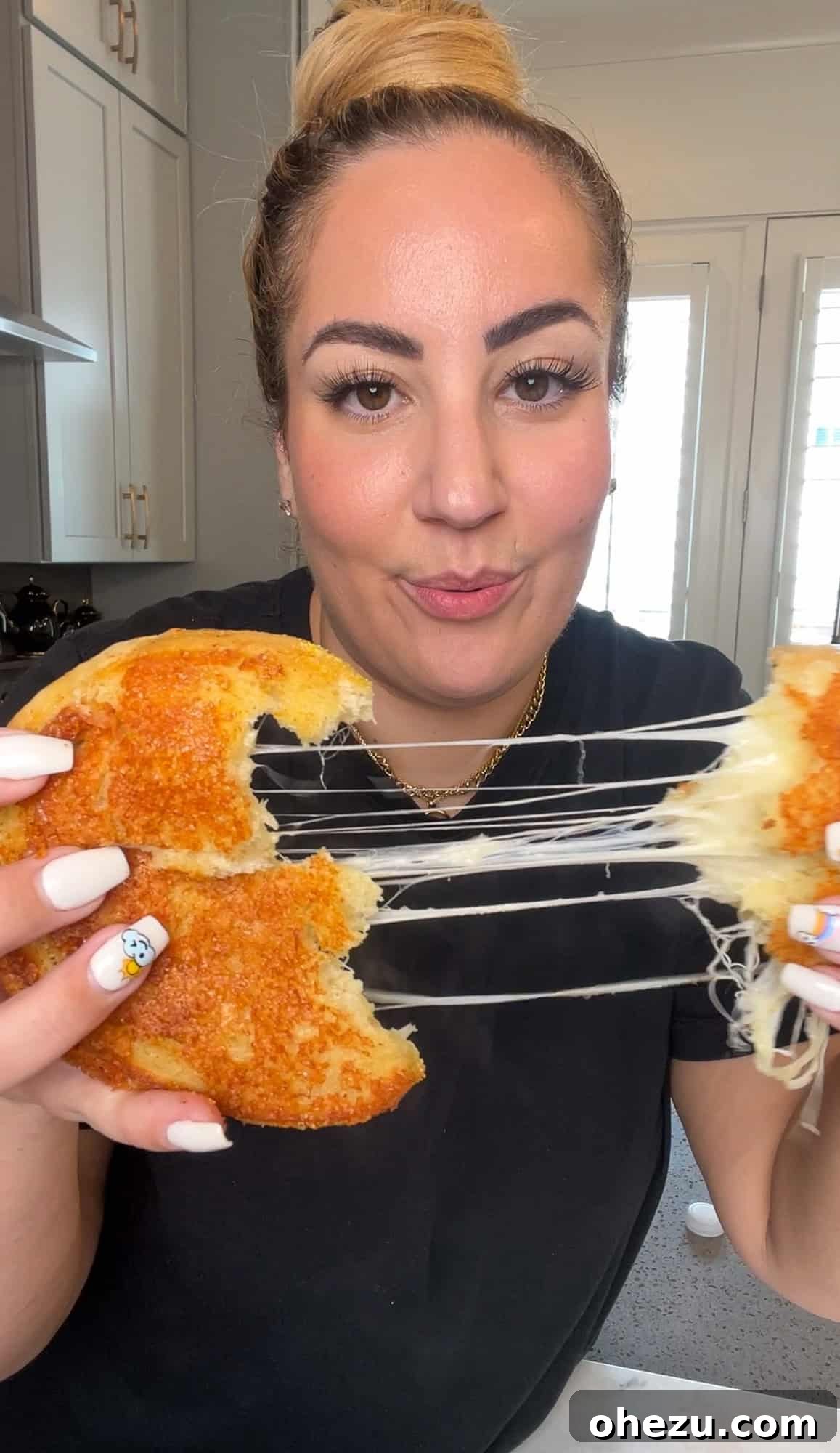 A close-up shot of a copycat grilled cheese sandwich, perfectly toasted with a slight golden sheen, indicating its delicious crispiness.
