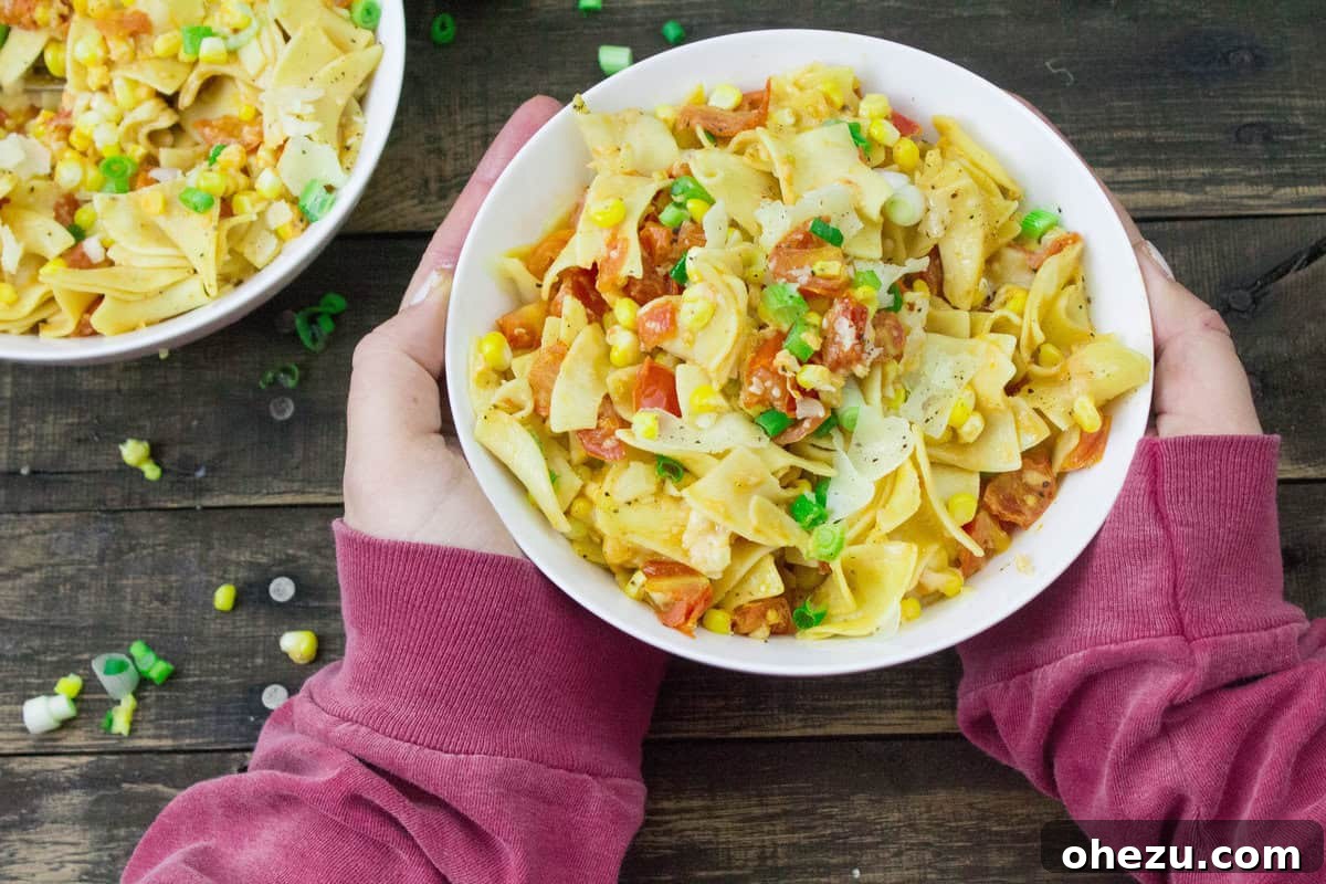 Pinot Grigio Pappardelle with Tomatoes and Corn 2 Cheesy Tomato & Corn Pinot Pappardelle - a vibrant pasta dish