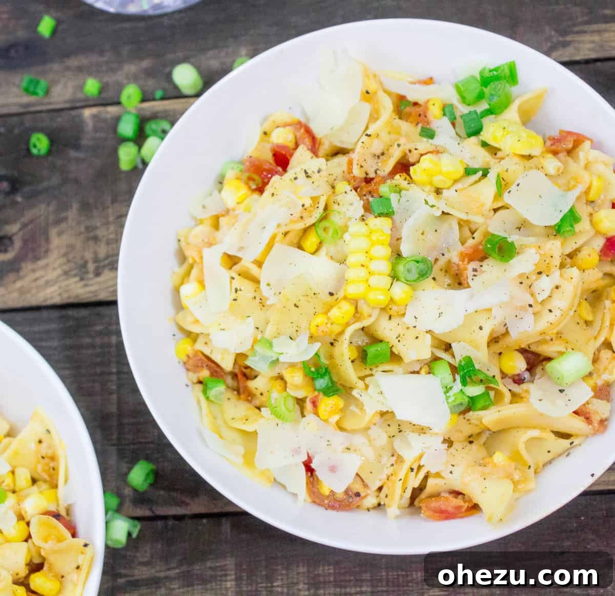 Pinot Grigio Pappardelle with Tomatoes and Corn 5 Plating a serving of Pinot Grigio Pappardelle with Tomatoes & Fresh Corn