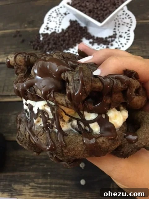 Close-up of a crave-able Chocolate Funnel Cake Ice Cream Sandwich ready to be eaten
