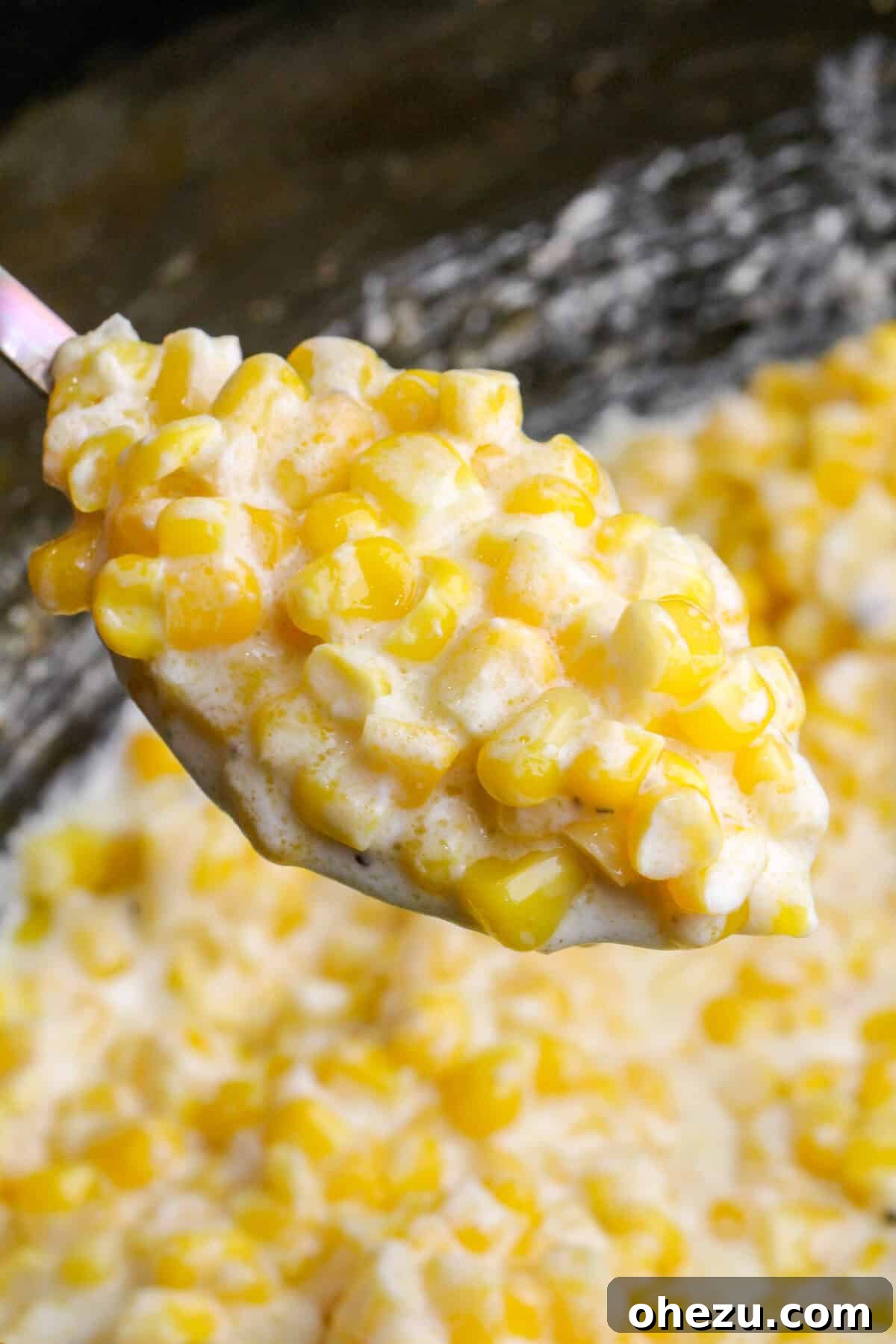 Creamed corn simmering beautifully in a crock pot