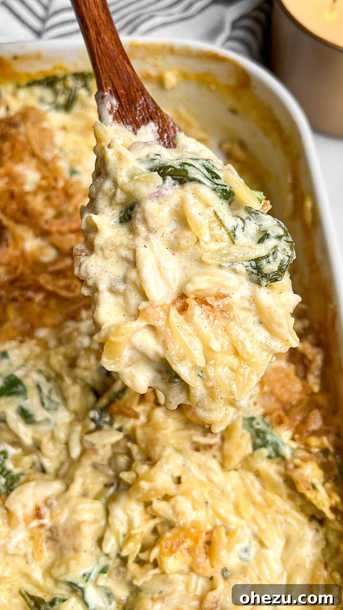 Cheesy Monterey Chicken Orzo Skillet 8 One-pan orzo in a casserole dish, ready to be served