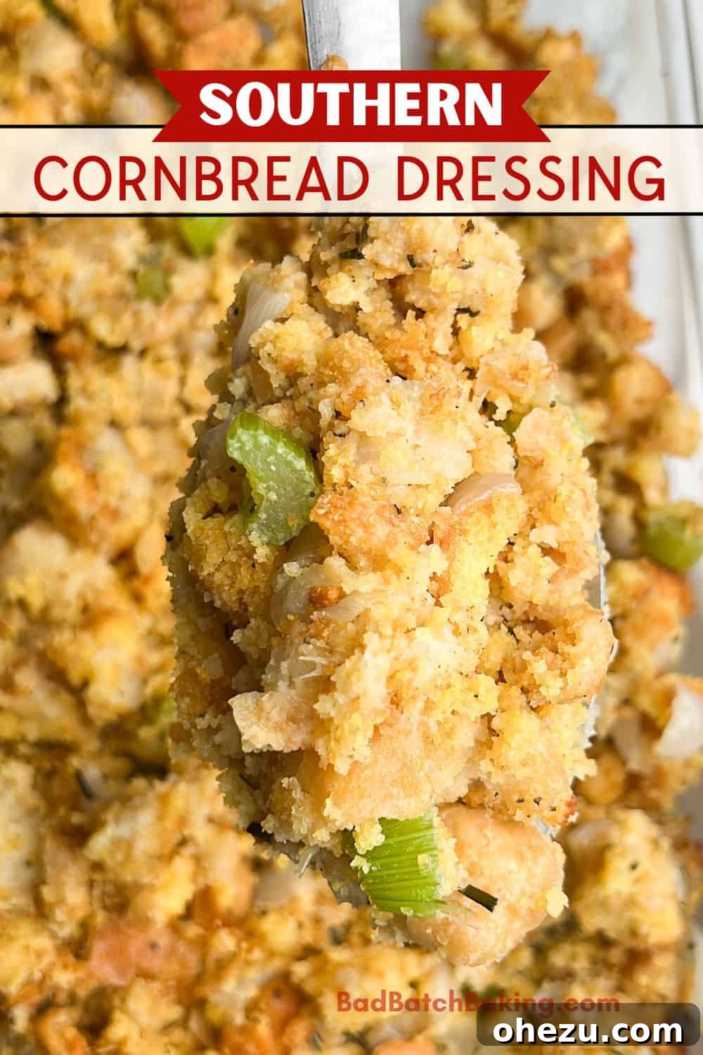 A close-up of a serving spoon scooping out Southern cornbread dressing from a dish.