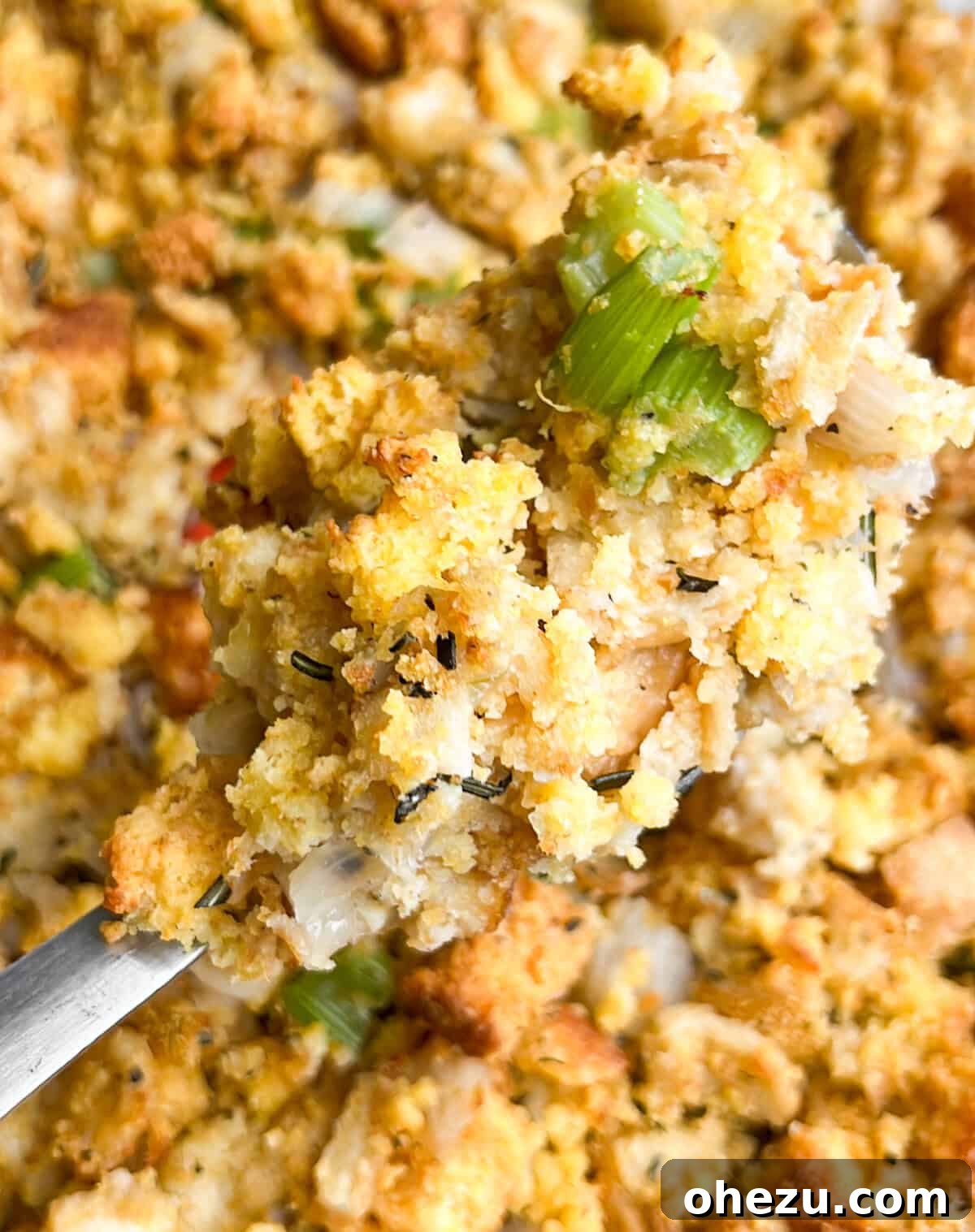 Ingredients for Southern cornbread dressing laid out on a wooden cutting board.