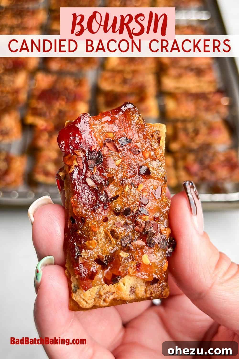 A cluster of Boursin Candied Bacon Crackers on a white plate, highlighting their creamy cheese and glistening bacon topping.