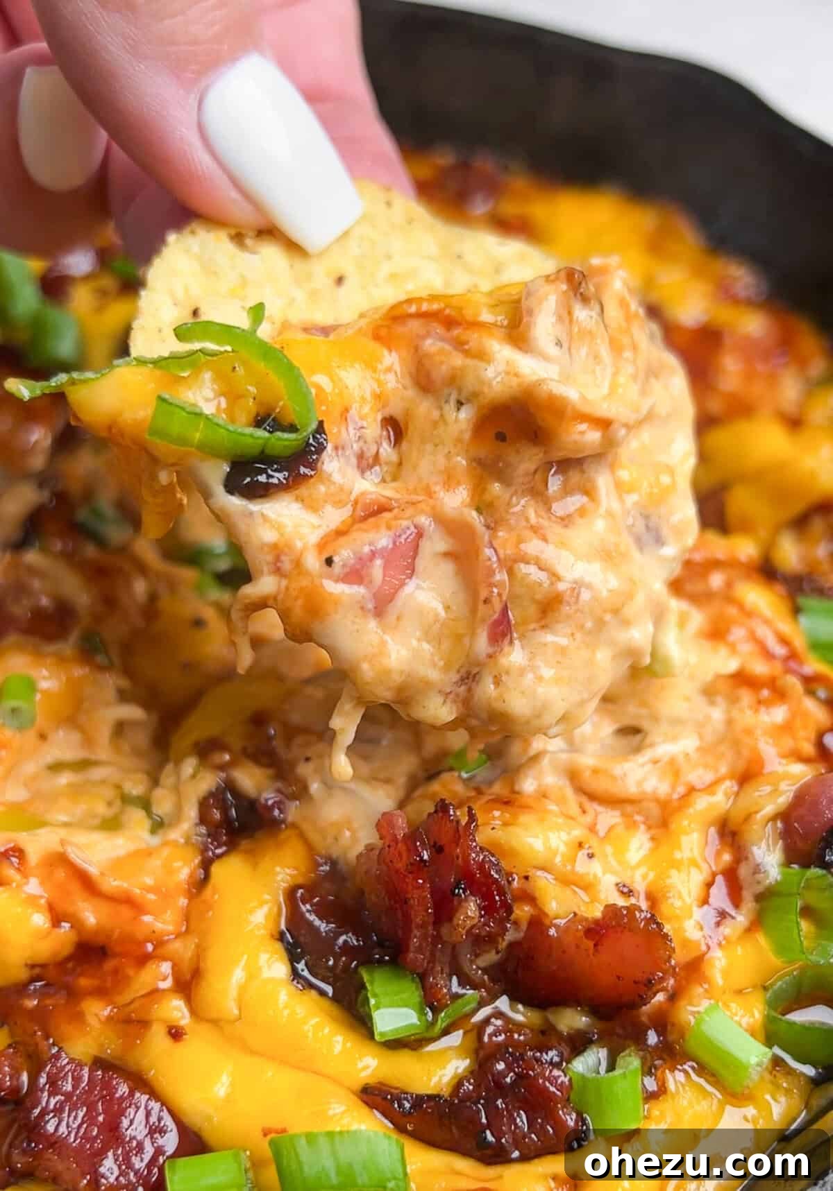 Over 70 Perfect Friendsgiving Recipes to Try in 2024 15 Creamy Barbecue Chicken Dip with Bacon and Peppers