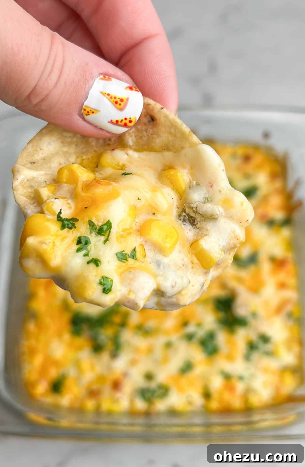 Over 70 Perfect Friendsgiving Recipes to Try in 2024 17 Creamy Cheesy Corn Dip, perfect for Friendsgiving potlucks