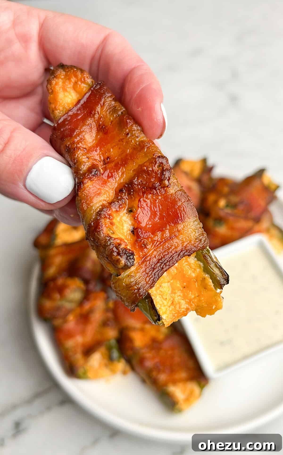 Over 70 Perfect Friendsgiving Recipes to Try in 2024 19 Creamy Bacon Wrapped Jalapeno Poppers for Parties