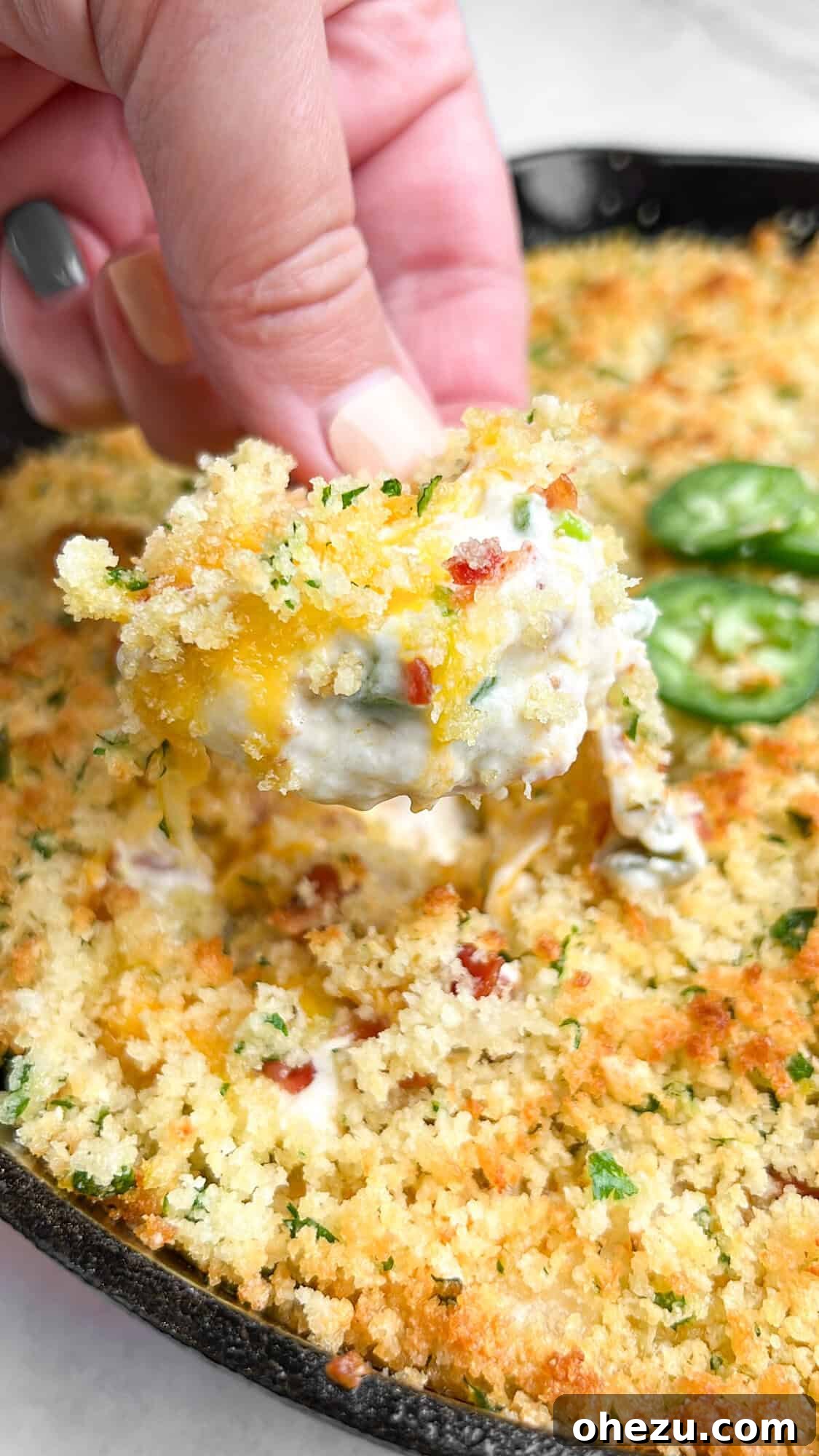 Over 70 Perfect Friendsgiving Recipes to Try in 2024 21 Rich Jalapeno Popper Dip with Bacon for Friendsgiving