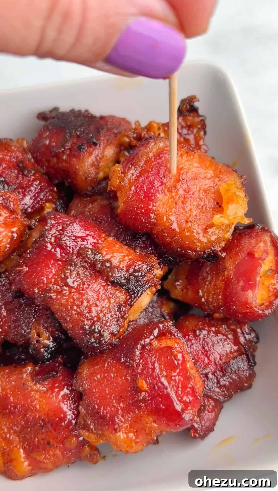 Over 70 Perfect Friendsgiving Recipes to Try in 2024 22 Air Fryer Bacon Wrapped Chicken Bites with Cheese
