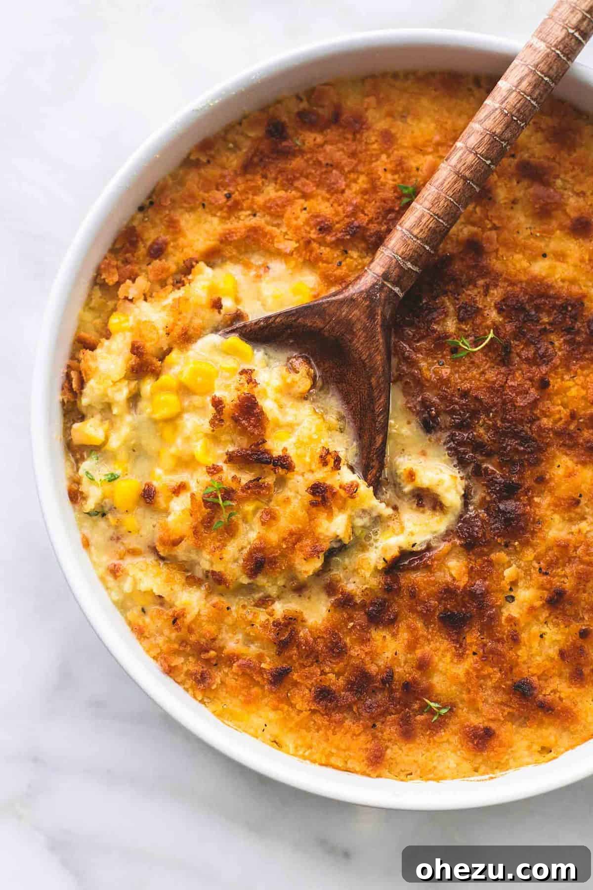 Over 70 Perfect Friendsgiving Recipes to Try in 2024 44 Quick Baked Parmesan Creamed Corn for Holiday Dinners