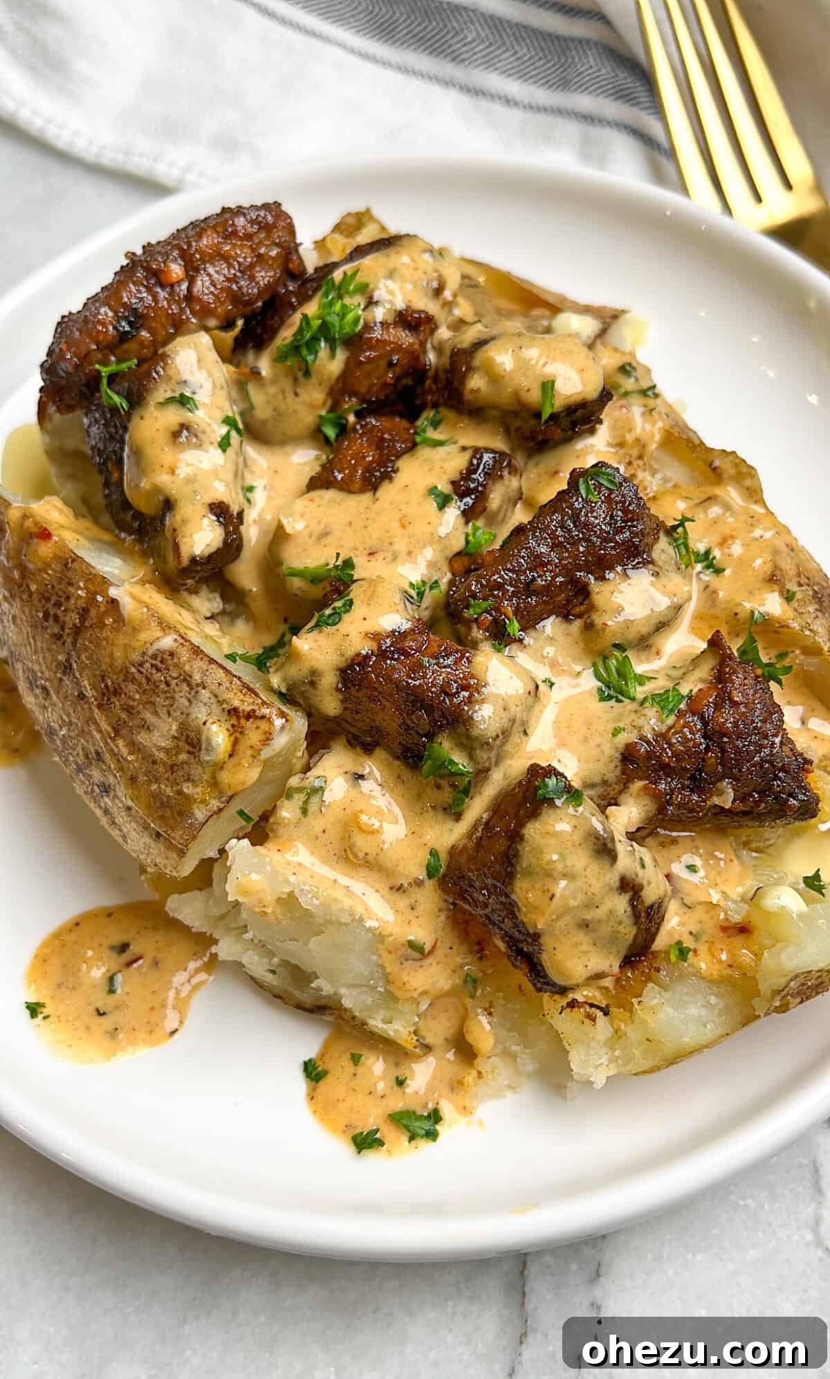 Over 70 Perfect Friendsgiving Recipes to Try in 2024 53 Loaded Baked Potato with Garlic Butter Steak Bites