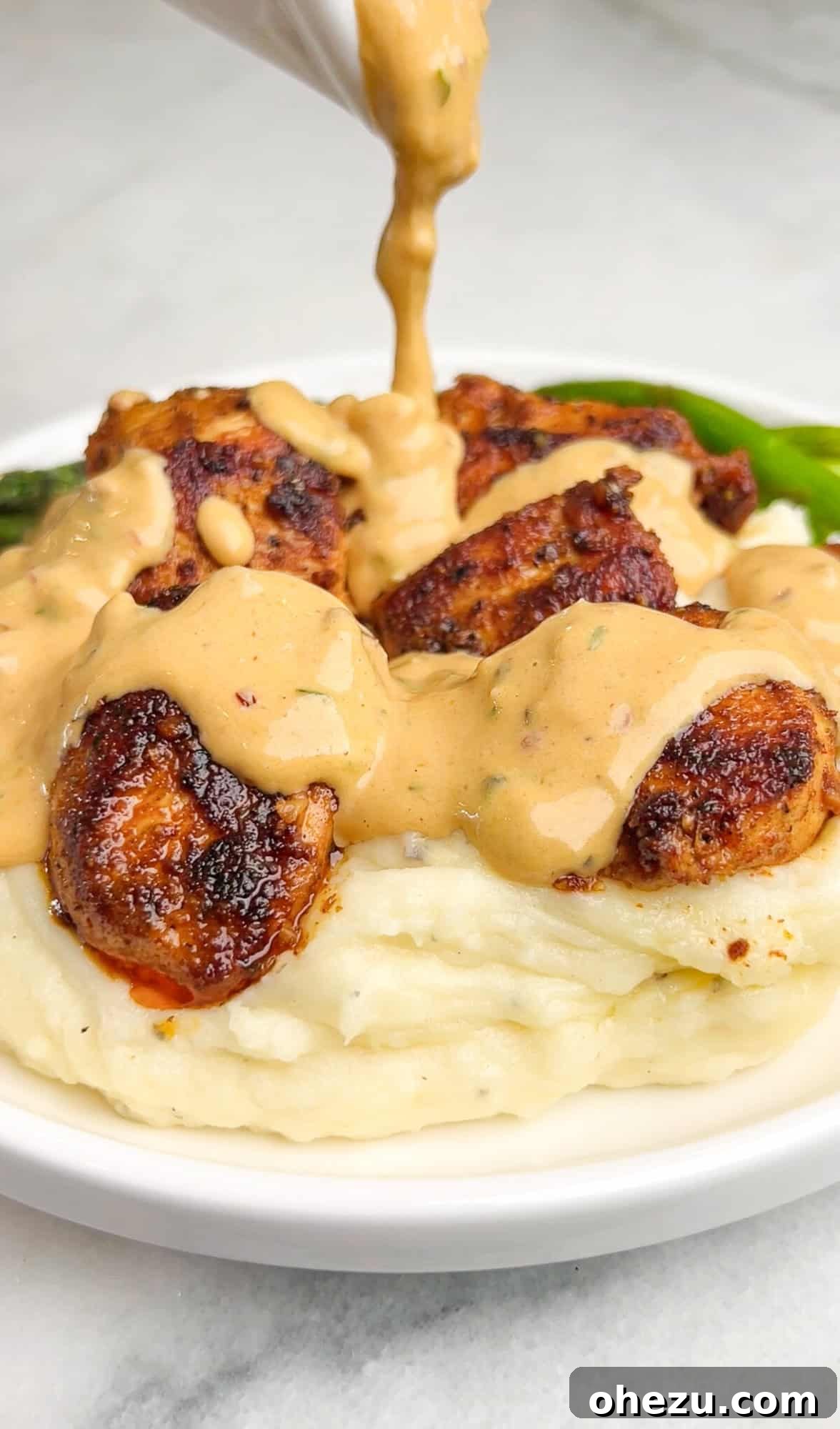 Over 70 Perfect Friendsgiving Recipes to Try in 2024 64 Creamy Garlic Parmesan Chicken with Lemon Gravy