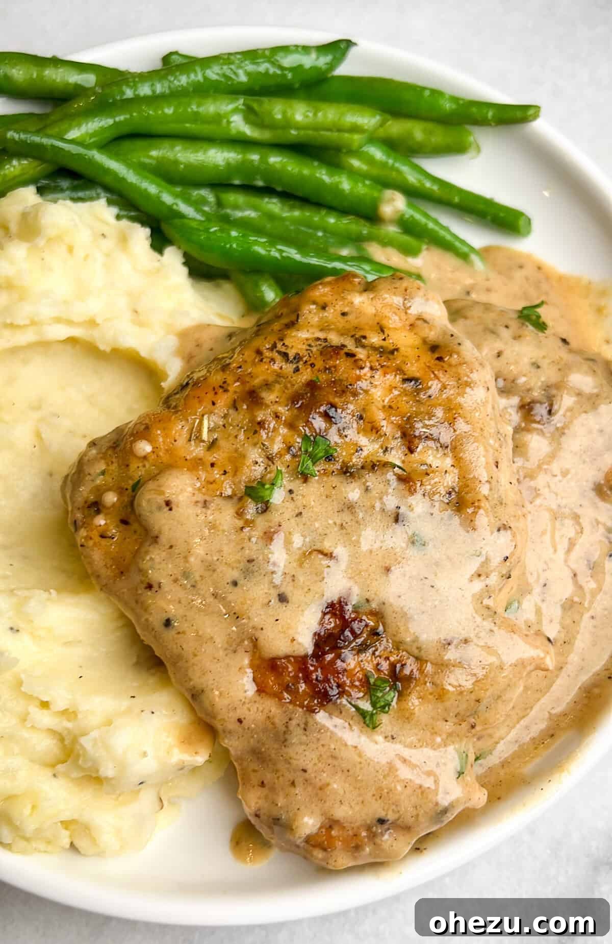 Over 70 Perfect Friendsgiving Recipes to Try in 2024 66 Creamy Garlic Chicken Braised in Parmesan Sauce