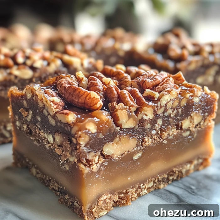 Over 70 Perfect Friendsgiving Recipes to Try in 2024 73 Buttery Caramel Pecan Dream Bars for Holiday Desserts