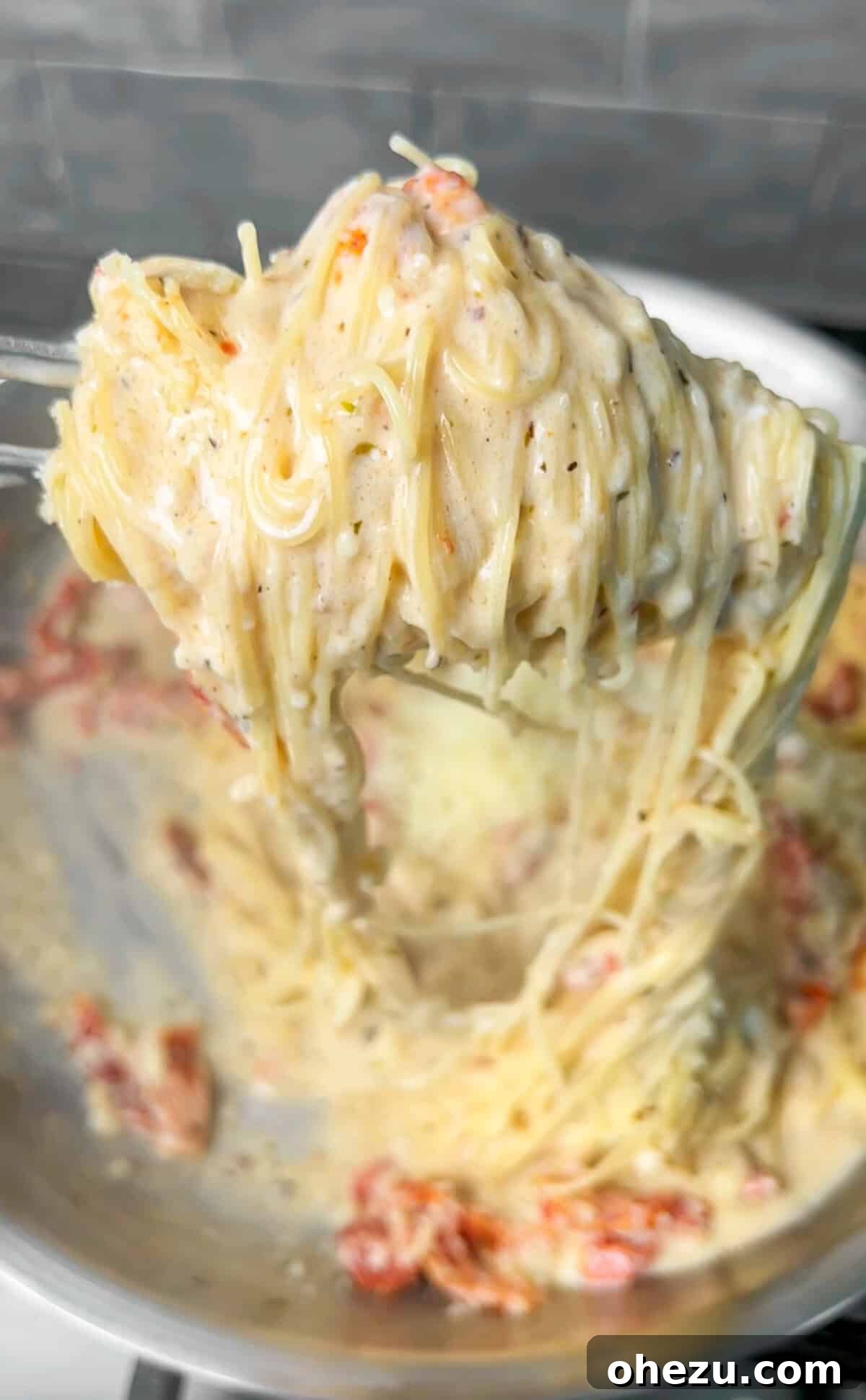Effortless Skillet Sun Dried Tomato Pasta 6 Finished one-pan sun-dried tomato pasta, garnished and ready to be served from the pan.