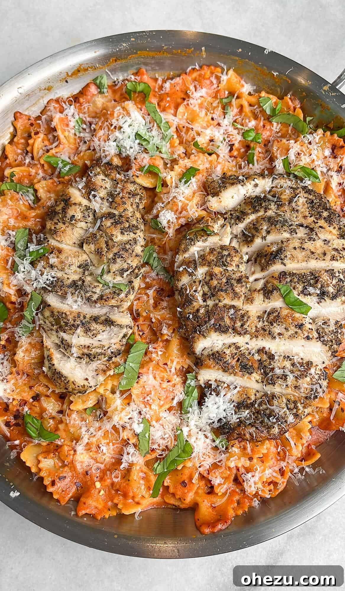 Rose pink pasta with chicken and fresh basil