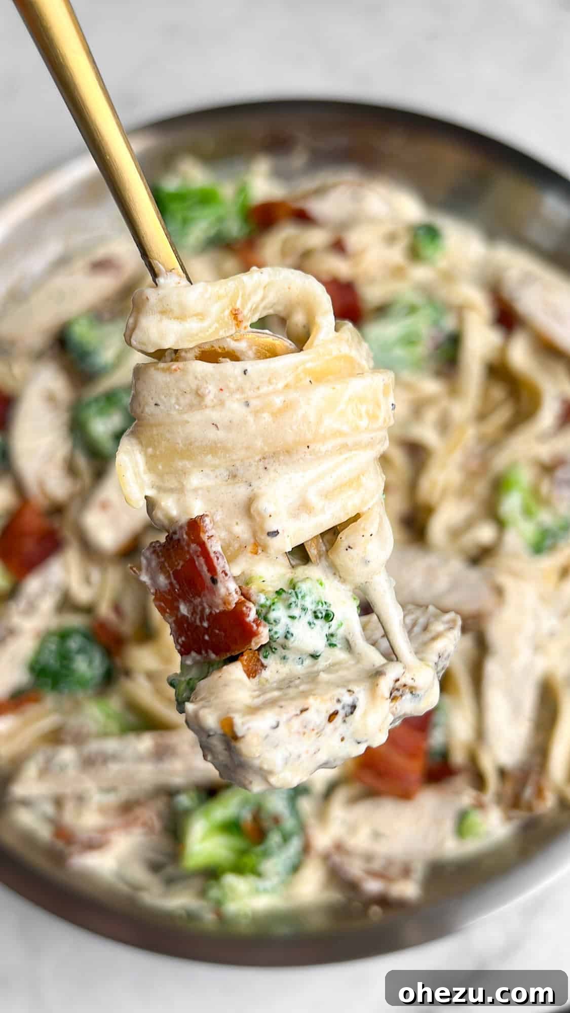 Golden Chicken & Crispy Bacon Broccoli Alfredo 3 Close-up of chicken bacon broccoli alfredo pasta