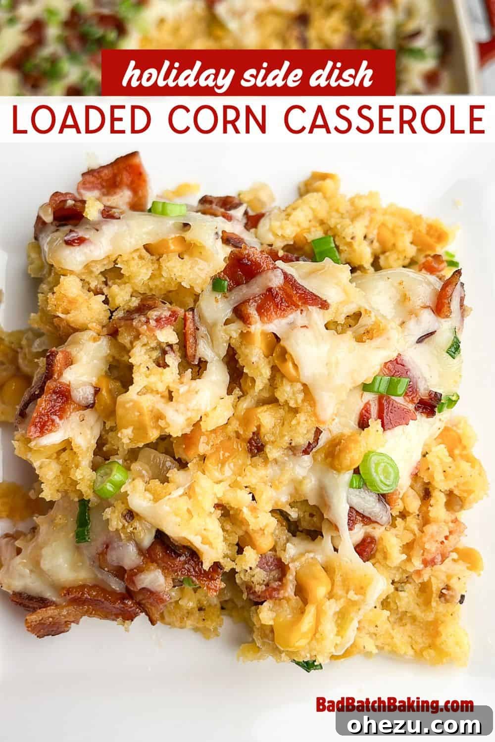 A festive holiday side dish recipe, the loaded corn casserole, in a beautiful serving dish