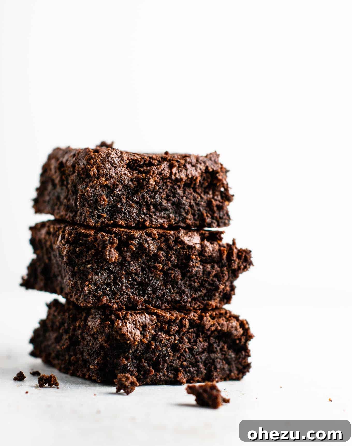 Ultra Fudgy Gluten-Free Brownies 2 Deliciously fudgy gluten-free and dairy-free brownies made with wholesome oat flour and coconut flour, perfect for a decadent dessert.